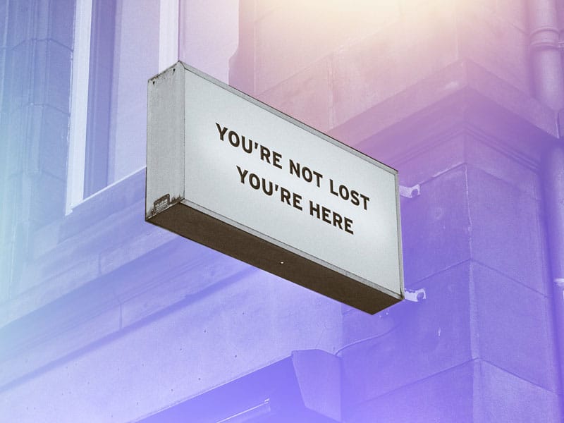 Perimenopause brain fog illustrated by a sign reading you are not lost you are here