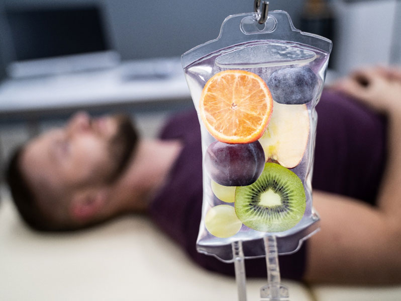 fruit slices in a saline bag to illustrate Nava IV Total Rejuvenation therapy