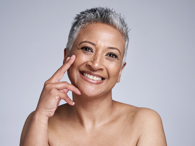 Smiling female to illustrate nonsurgical facelift options