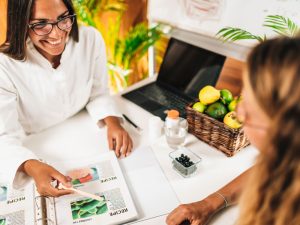 nutritionist and client discussing result of diagnostic testing