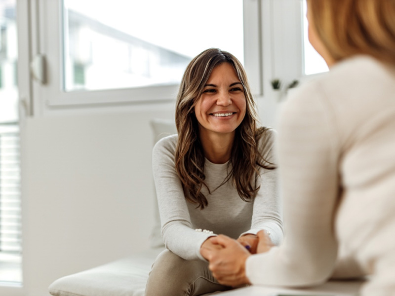 woman helping patient, to illustrate hormonal imbalance after hysterectomy