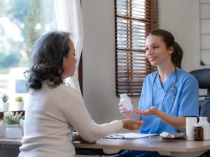 doctor and elderly patient discussing possible medication