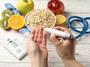 female checking blood sugar