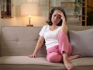 old lady on couch to illustrate thinking about reverse aging