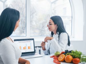 female nutritionist giving advice about good diet during perimenopause