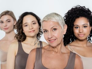 older woman smiling to illustrate having kept to a healthy perimenopause diet