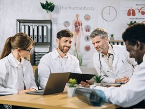 group of medics to illustrate discussing integrative and functional medicine versus traditional medicine