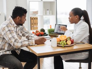 woman discussing integrative medicine with patient