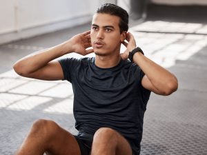 Fit man in gym to illustrate the importance of testosterone