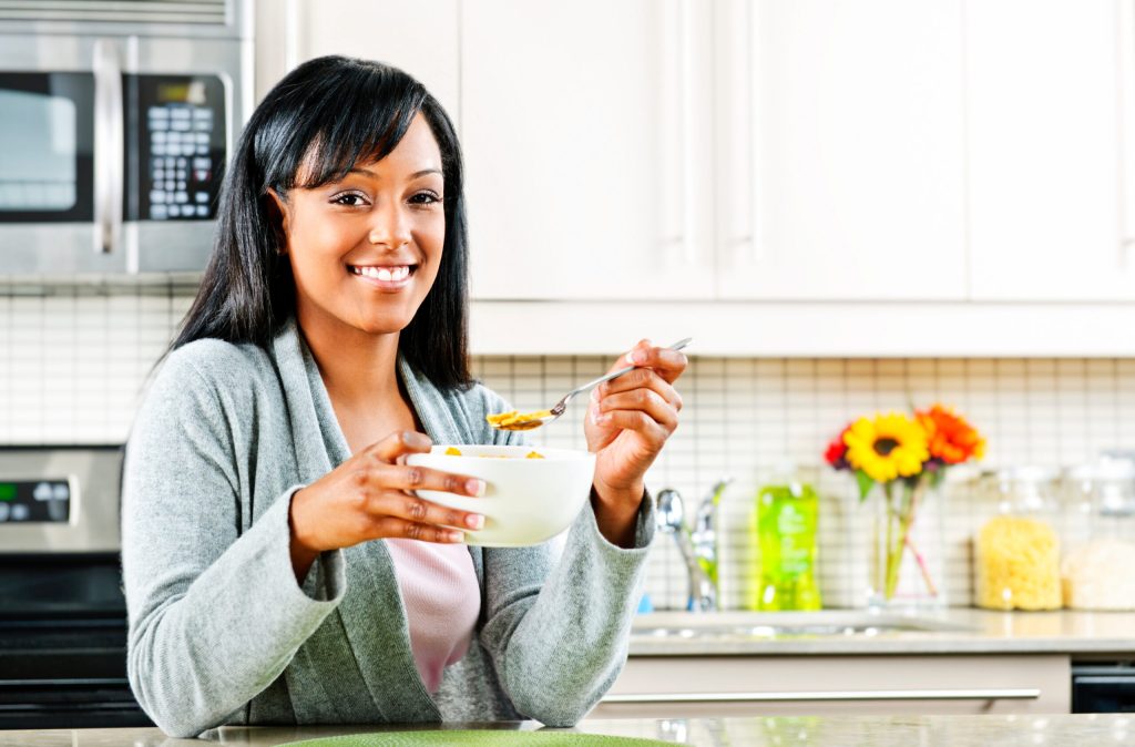 Woman having breakfast